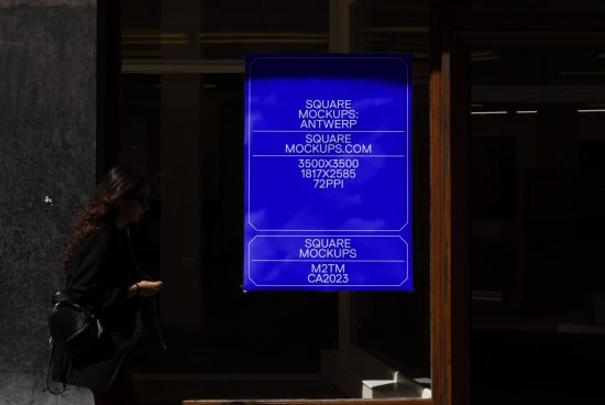 Woman passing by illuminated blue sign mockup with square design specifications on city street, ideal for outdoor advertising graphics display.